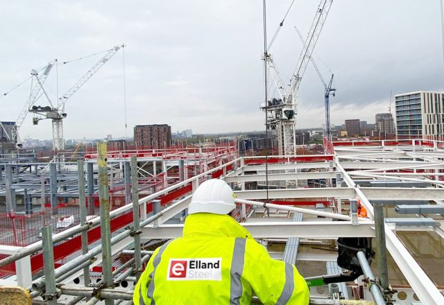 MGY site manager overlooking steel frame