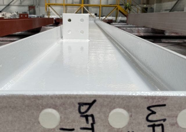 Steel beam with in-house shop applied Intumescent coating