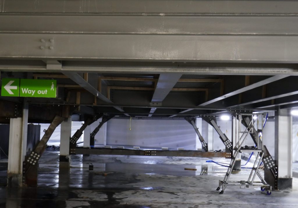 Temporary steel used to prop up the slab of car park