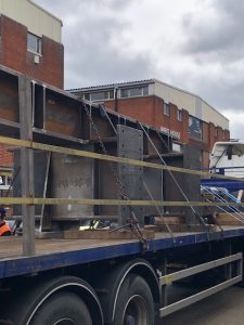 Lorry in transit delivering two modules that were pre-welded
