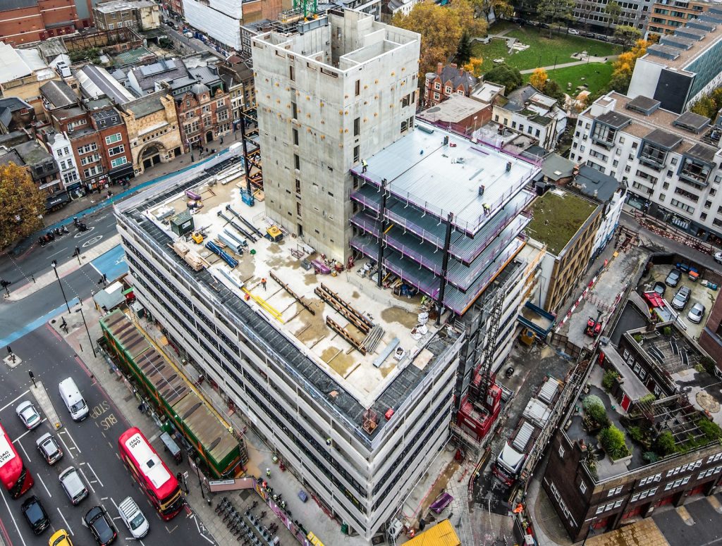 refurb construction site next to busy roads